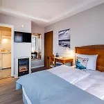 酒店 Buengers Apartment-hotel Mit Gartensauna - Modern, Gemuetlich Und Strandnah 施特兰德