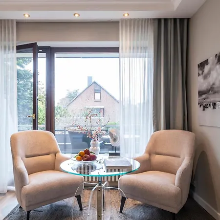 Buengers Apartment-hotel Mit Sommerstrandkorb & Gartensauna Отель 4*