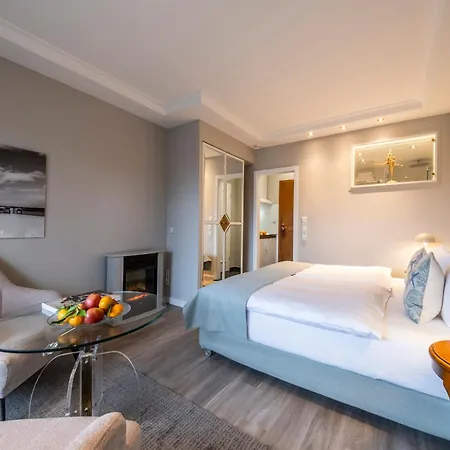 Отель Buengers Apartment-hotel Mit Sommerstrandkorb & Gartensauna Штранде